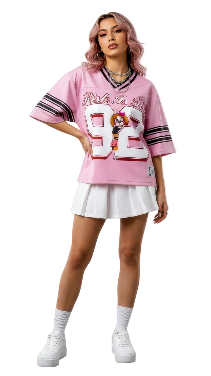 RiRi the Beagle mascot sports jersey in pink and white, premium activewear for dog lovers featuring a breathable V-neck design and athletic fit.