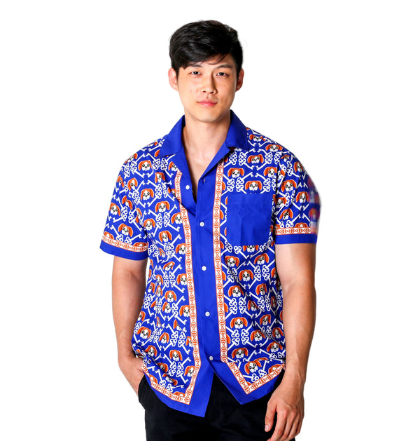 Close up of Model wearing Rik’s Pawsitive Vibes camp shirt buttoned up with a classic collar, featuring the all-over Rik the Beagle and Risk is Key logo print.