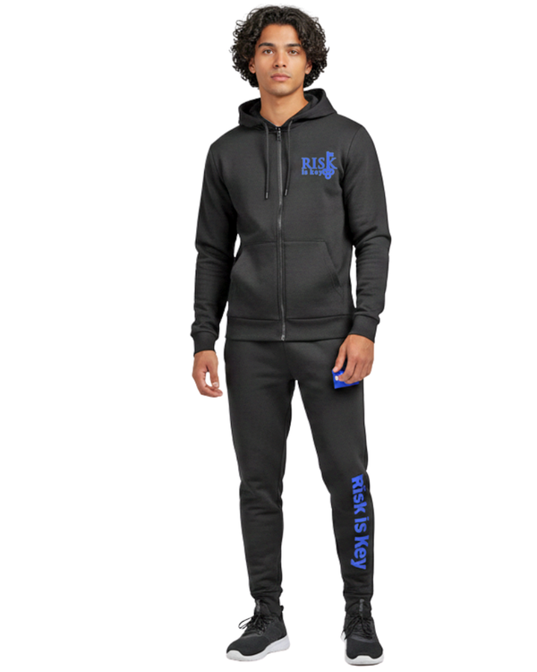 man wearing Drawstring Full-Zip Hoodie with Risk is Key Signature Logo