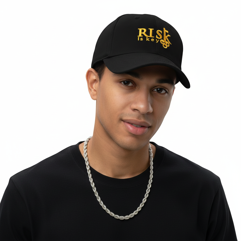 Risk is Key Dad Hat with Signature Logo on Gez Z male styled with black t-shirt