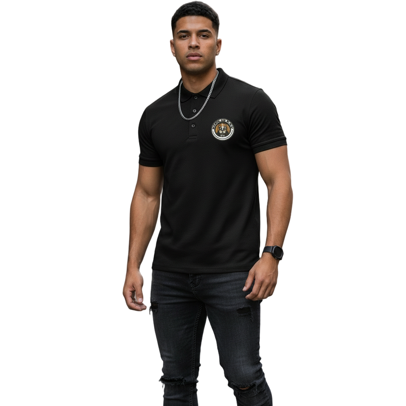 Man wearing a black polo shirt with Riskiskey Mascot - Rik the Beagle