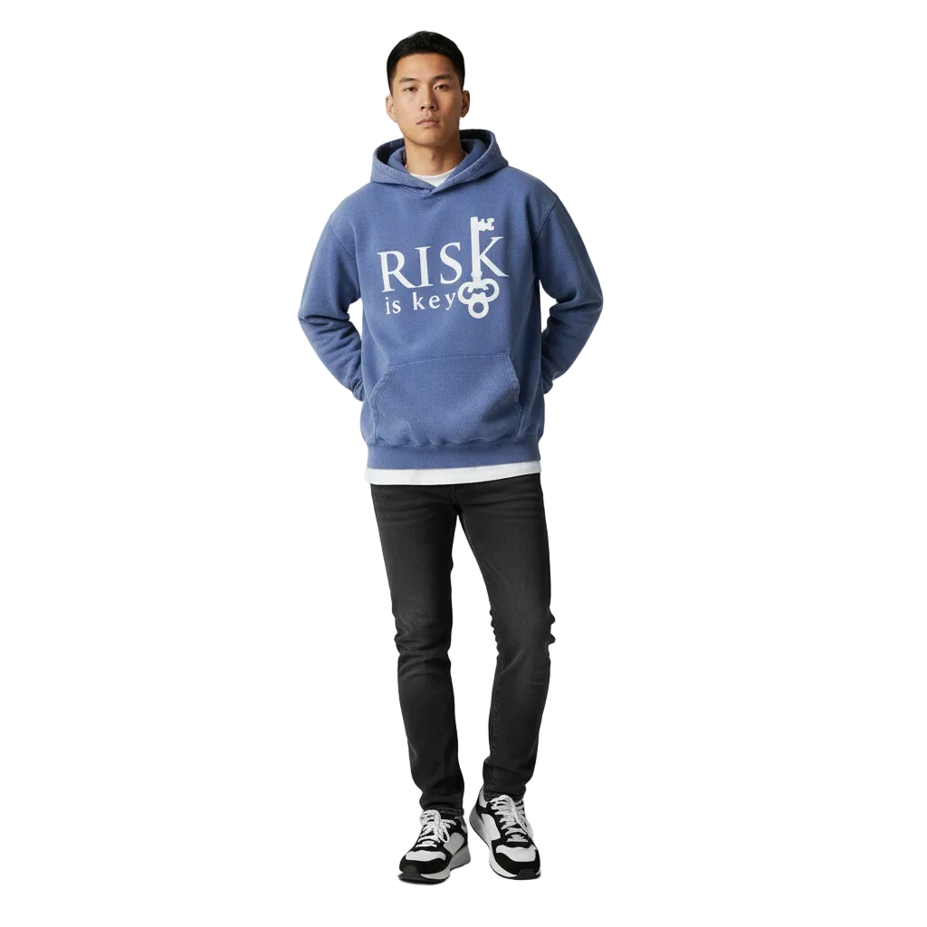Gen Z Asian Male model featuring the Signature Risk Vintage Wash Pullover hoodie in blue, highlighting the unique sun-faded pigment dye and oversized silhouette.