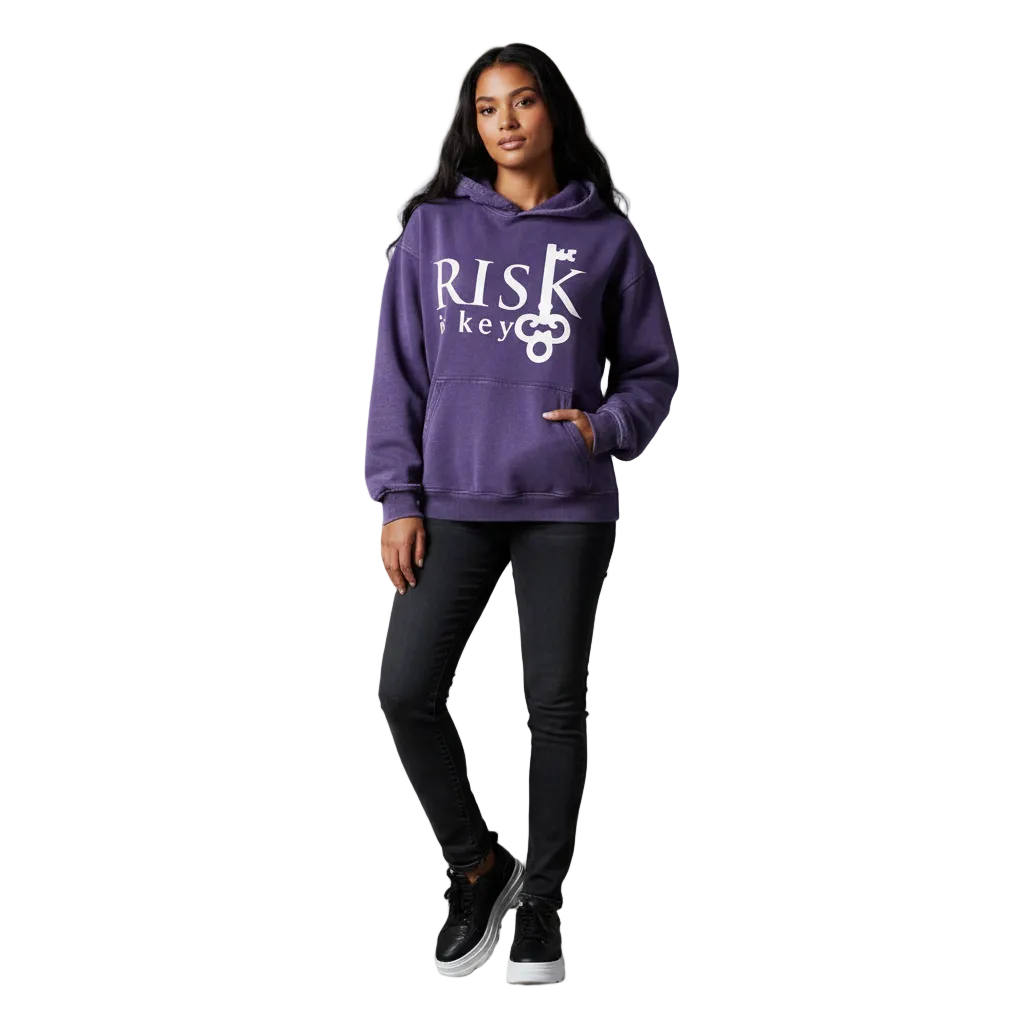 Gen Z Female model wearing the purple Signature Risk Vintage Wash Pullover, showcasing the premium heavyweight fabric and iconic chest logo embroidery.