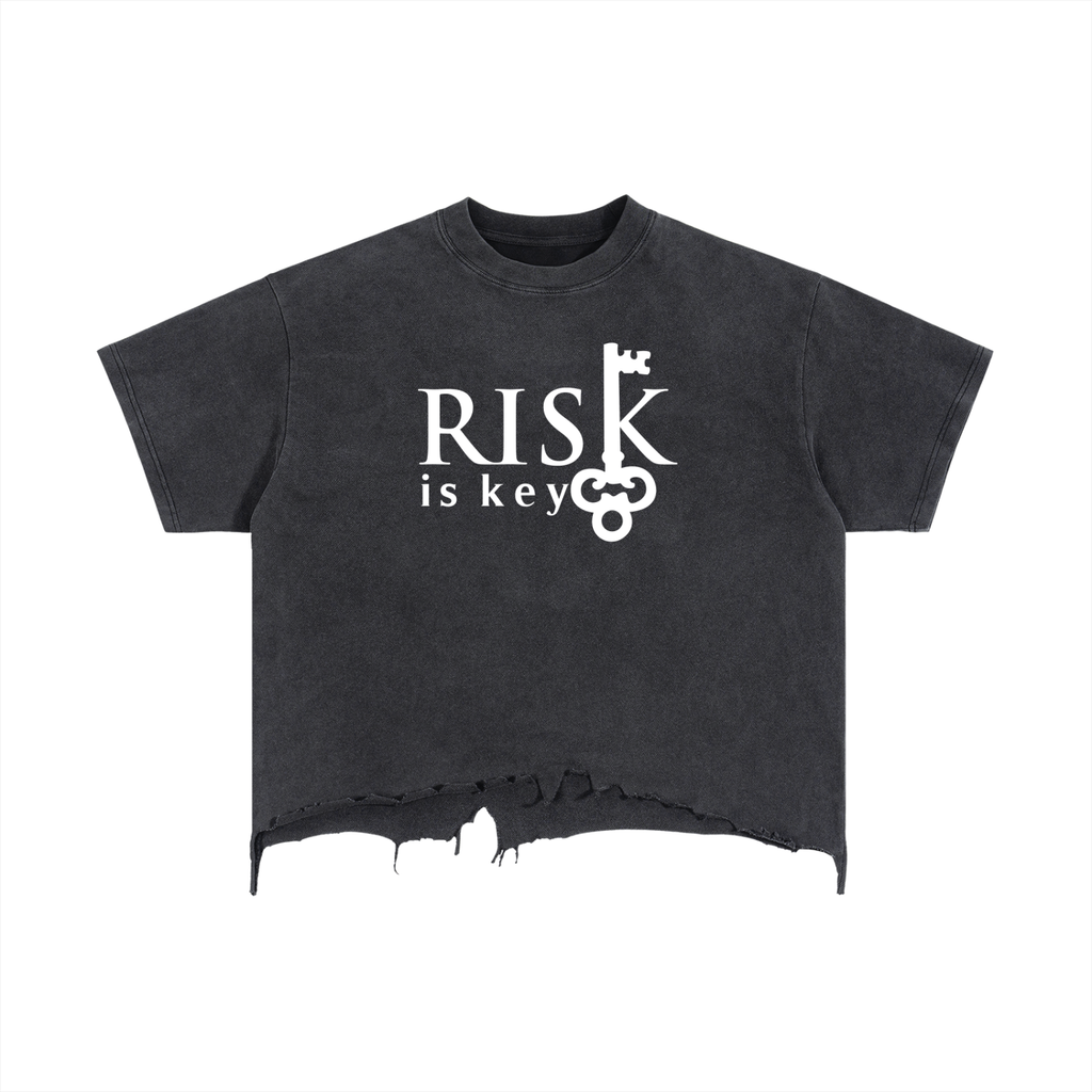 Black t-shirt with 'RISK is key' text on a white background