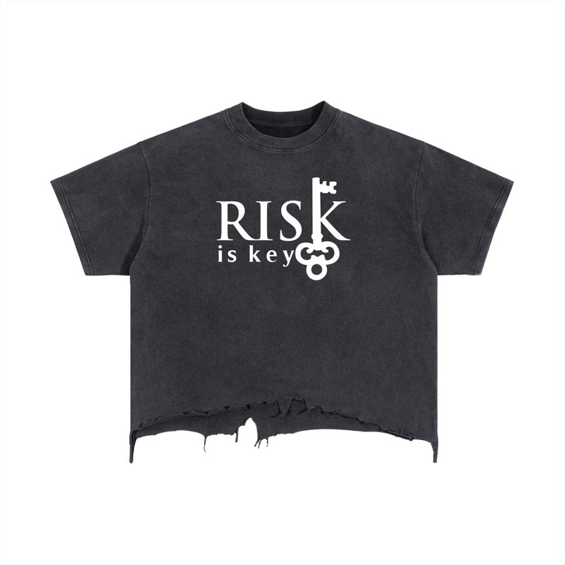 Black t-shirt with 'RISK is key' text on a white background
