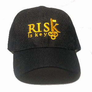 Risk is Key dad hat for men with adjustable strap and curved brim front view.