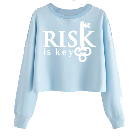 Risk is Key Signature Logo Women's Cropped Pull Over Hoodie in light blue